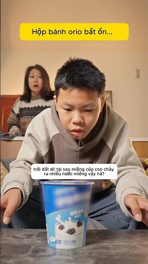 The boy had a strange box of Oreo cookies.