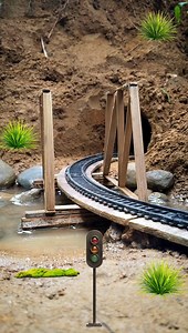 16K views · 116 reactions |  Realistic Miniature Train Scene | Diorama Bridge Crossing with Signal Light | 4K Cinematic #Diorama #MiniatureTrain #RealisticModel #TrainCrossing #ModelRailroad #SignalLight #BridgeScene #CinematicVideo | Dilip Nath Blog | Facebook
