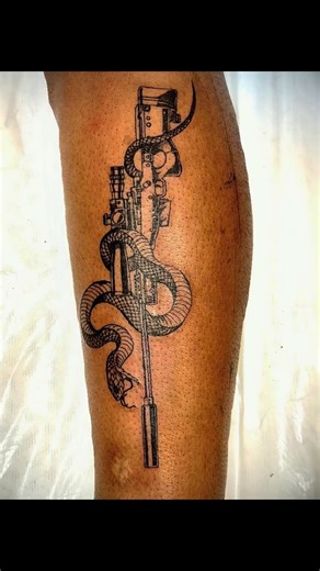 “Wrapped in artistry and strength 🐍🔫 This detailed snake and rifle tattoo tells a story of power and protection. Ready to make your mark? #TattooArt #Inked” @ਢਿੱਲੋਂ #tattoos #tattoo #snaketattoo #sniper #legtattoo #awm #desi #novascotia #desinovascotia #halifaxpunjabis #desitattoo #artist #punjabi #snake #cheemay #TattooPromotion #SnakeTattoo #RifleTattoo #TattooArtist #InkedLife #BodyArt #TattooDesign #ArtOnSkin #TattooInspiration #TattooCommunity