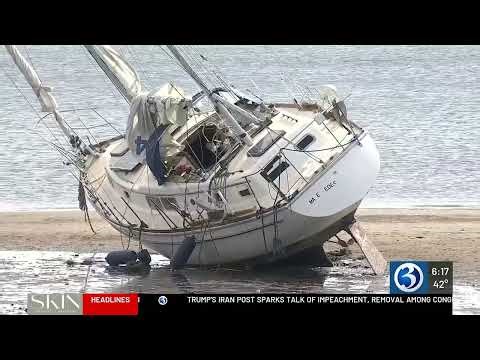 Man behind bars also owns stuck sailboat in New Haven