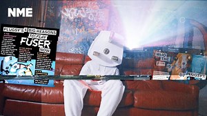 Excited for you to watch this: it's our three part, fly-on-the-wall mini-series following DJ Plugsy, the Marmite Marshmello, as he navigates life in lockdown as a helmet-headed EDM would-be-superstar. | NME
