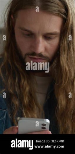 Caucasian student guy man male celebrating winning using mobile phone positive winner cyberspace joy win money prize shouting online bonus cashback screaming happy in university college feel happiness Stock Video Footage - Alamy