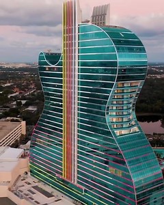 The world’s first guitar-shaped hotel in Hollywood, Florida. The new hard rock hotel & casino has been designed by Klai Juba Wald Architecture + Interiors. The entire façade has been transformed by float4 into a digital sculpture — capable of presenting a multitude of visual effects and presentations that utilize 2.3 million LED lights, video mapping and lasers. Video by @jeremyaustiin on Instagram #usa #florida #awesome #архитектура www.amazingarchitecture.com ✔ www.facebook.com/amazingarchitec
