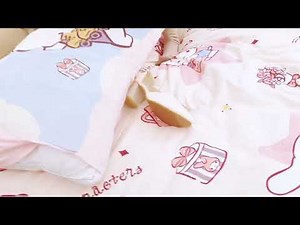 A girl trampling a bed and pillow in her high heel