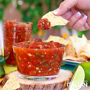 Lazy Day Salsa is a perfectly scoopable restaurant-style tomato salsa that is whipped up in a flash and tastes like you spent hours perfecting it. Recipe: https://www.theslowroasteditalian.com/2015/06/lazy-day-salsa.html
