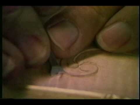 Homer Dangler Carving a Kentucky Long Rifle