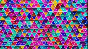 Looping animation of a group of multicolored plastic triangular geometric shapes. Looped movement.