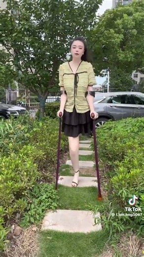 amputee woman crutching