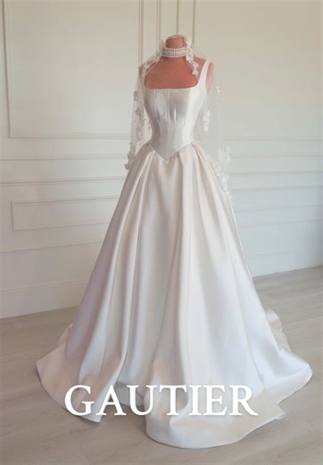 Timeless elegance, modern romance 🤍 A structured corset, soft draping, and delicate details that make this gown unforgettable. ✨ Made for the bride who loves classic beauty with a refined twist ✨ Visit the LARGEST dress store in Texas 📍 location 10515 I-10 San Antonio, Tx 🌐 Book your appointment at https://www.gautierdresses.com/appointments #GautierBridal #TimelessBride #ClassicBride #ModernRomance #WeddingDressInspo TexasBrides CorsetWeddingDress