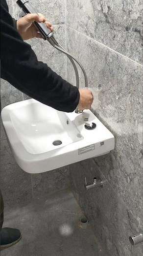 Installing a basin mixer for a functional washroom!