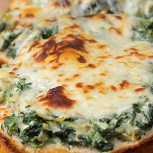 This quick and easy garlic bread gets a spinach and artichoke upgrade in under 30 minutes. We predict it will be a dinner series regular! Recipe: https://tasty.co/recipe/spinach-and-artichoke-garlic-bread Want more videos? Subscribe to Tasty: https://bit.ly/2AgbiMp | Tasty