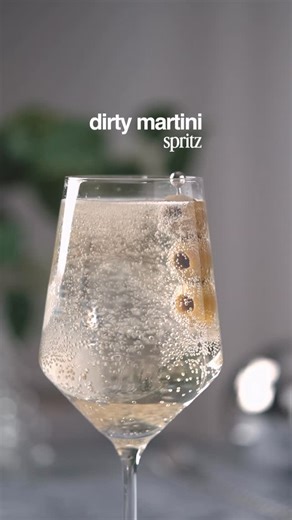 Sean Briggs on Instagram: "Ring in the New Year with your favorite martini, just in spritz form! 🍾✨ 🥂 DIRTY MARTINI SPRITZ 🥂 - 1oz gin - 3/4oz dry vermouth - 1oz olive brine - 2oz tonic water - 3oz Prosecco In a spritz glass, combine gin, dry vermouth, olive brine, tonic water and Prosecco. Stir to combine then garnish with three olives. 21+ to enjoy 🍸 #dirtymartini #spritz #nye #newyears"