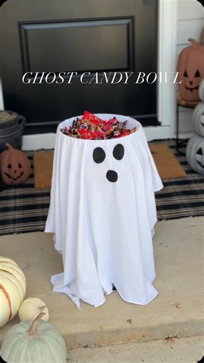 Recreating the viral DIY ghost candy bucket 👻🍬 I got some fabric from hobby lobby, and one sheet of black felt to cut out the eyes and mouth, along with a bowl from the dollar tree, and added it all to this plant stand! I plan to add some twinkle lights under the sheet on Halloween night for cuteness & visability ☺️✨ #halloweendecor #halloweendiy #halloweencandybowl #halloweenhacks #spookyseason | Creatively Crisp