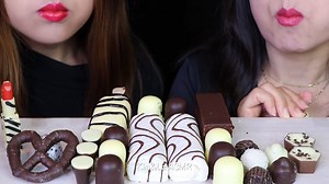 122K views · 99 shares | BLACK + WHITE (MAGNUM ICE CREAM, EDIBLE LIPSTICK, BOBA, CHOCOLATE MARSHMALLOW, KINDER, ZEBRA | Kim&Liz ASMR | Facebook