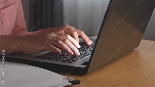 Concentrated female hands typing report laptop keyboard with dedicated focus online project work business computer technology internet finding solution writing corporate email message home office