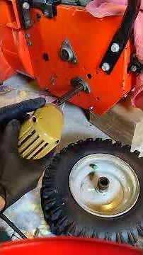 How to fix a stuck on snow blower wheel