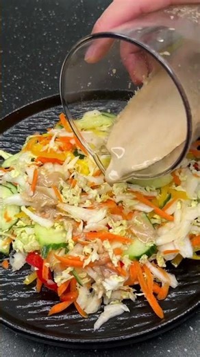 Warm Asian salad with teriyaki chicken and peanut crumble
