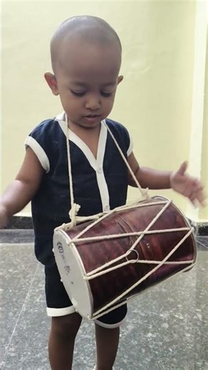 baby girl playing dolak 🤩 #festival #music #dance #dj #drums #cutebaby #baby #musicalinstrument