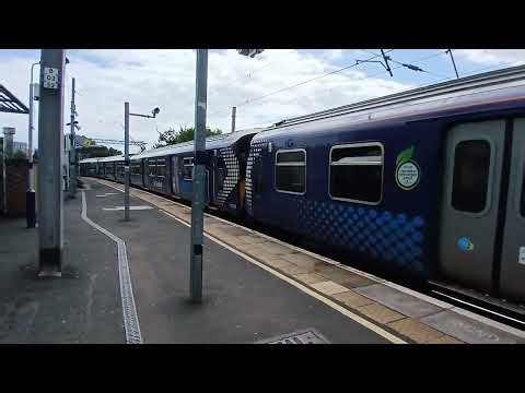 class 318 + 320 departing Partick for Balloch