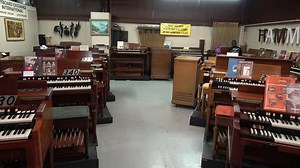 1957 brown walnut finish with Leslie. Call for more information (407) 323-7493 | Keyboard Exchange International