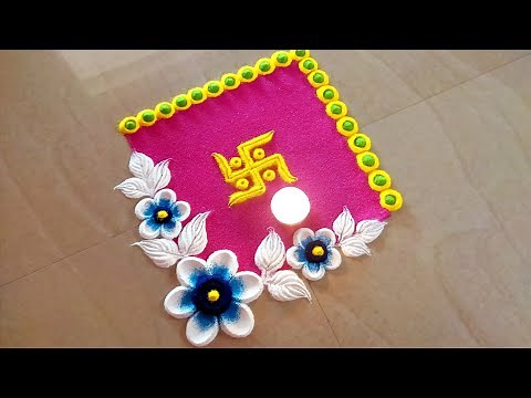 simple swastik rangoli design. Easy rangoli designs. unique rangoli design.