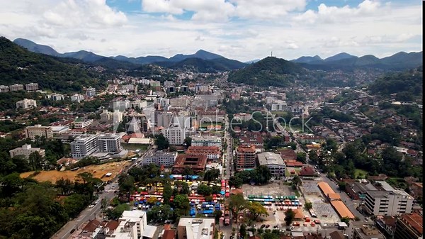 Aerial drone view of the city of Teresopolis in the mountainous region of Rio de Janeiro, Brazil with the iconic Alta Market in the foreground