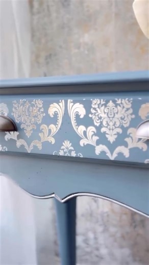 Glam meets elegance in this stunning table transformation! In this reel, Brand Ambassador @click2restore gives an ordinary piece a glamorous glow-up with a light and fresh blue hue, shimmering silver accents, and beautiful faded details that add charm and sophistication. She used the Silver House of Damask Decor Transfer® and the Renata Decor Stencil®️ from the luxe Kacha Collection, creating a timeless design that glimmers with style.This makeover is perfect for anyone who loves DIY furniture f