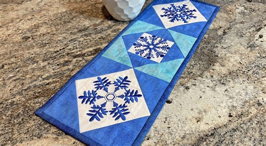 Nancy Zieman The Blog - Quick Quilting in the Hoop: Winter Snowflakes Mini Wall Quilt Embroidery Tutorial
