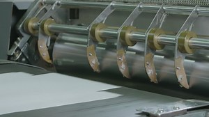 Workflow for making Cut pack copier papers are passing though conveyor belt before cover is made | Premium Stock Video Footage