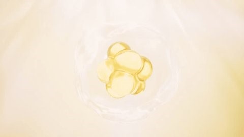 clip-3997518563-abstract-golden-cell-division-process-3d-animation