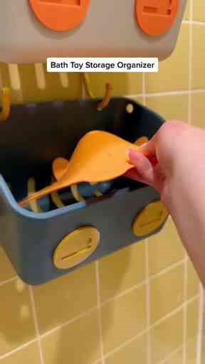 This bath toy storage organizer from Amazon has been our favorite so far!