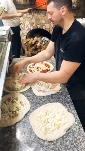 "INSANE Speed! Making 5 Pizzas at Once in a Bustling Wood-Fired Kitchen"