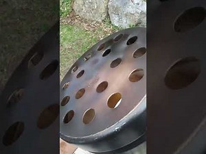 Make a mini smoker from a Weber Smokey Joe grill.