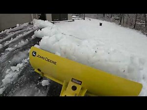 John Deere 44 inch front blade on an X380 - plowing heavy wet snow