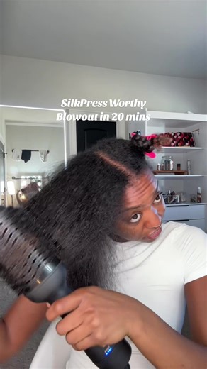 My new blowout method only takes me about 20 mins to complete. Let me know if you give this method a try. You can use any hair dryer you want but the key is to stretch before your blowout. #blowoututorial #naturalhair #silkpress