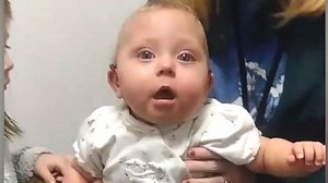 Adorable moment baby hears for the first time