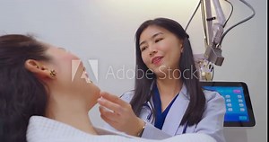 Beautiful female doctor talking with female patient at hospital room. Healthcare, Doctor, Lifestyle, Pregnant, Newborn and Happiness concept.
