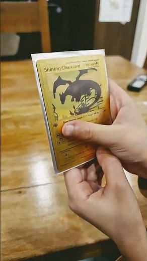 Super rare shining Charizard first edition golden pokemon card... apparently...