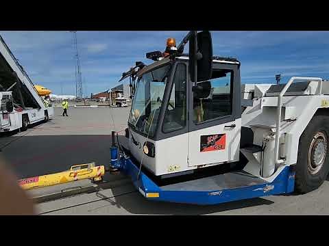 How to connect the TOWBAR to the NOSE WHEEL of the BOEING 747 before PUSH BACK