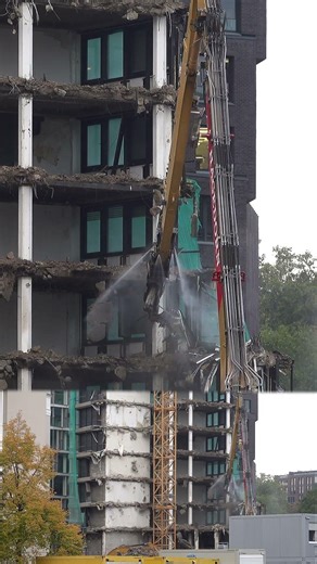 Long-reach excavator at a barely 60 years old listed skyscraper