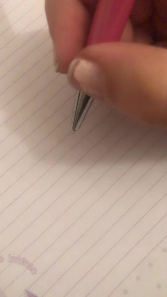 Step-by-Step Flower Drawing Tutorial on Lined Paper