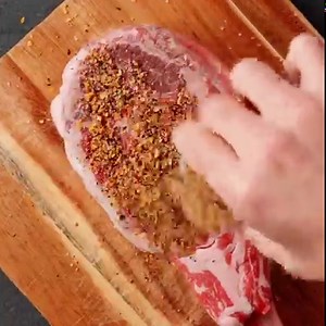 1.9K views · 122 reactions | Try your hand at this Reverse Sear Cowboy Steak that’s slow smoked for a ton of moisture and flavor. With bold, tangy seasonings in a delicious crust topped with a bright, zesty chimichurri sauce, you’ll be surprised by how easy it is to grill such a mouthwatering ribeye! See the full recipe at the link in bio: @keviniscooking https://keviniscooking.com/reverse-sear-cowboy-steak/ | Kevin Is Cooking | Facebook