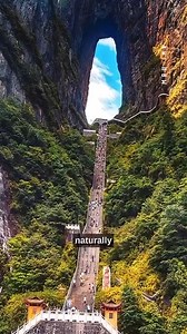 25K views · 248 reactions | Where Earth Meets Sky… ⛰️☁️ High in China’s Tianmen Mountain, a colossal arch cuts through the clouds—Heaven’s Gate. Formed by nature, revered by legend, it’s said to be a portal between worlds. Would you walk the steps to the sky?  MRU.INK #HeavensGate #TianmenMountain #SacredMountains #NaturalWonders #AncientExplorers #MysticPlaces #ChinaUncovered #HiddenWorlds #LegendsInStone #ReelHistory | Ancient Explorers | Facebook