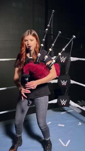 Drew McIntyre’s theme on bagpipes, in the ring