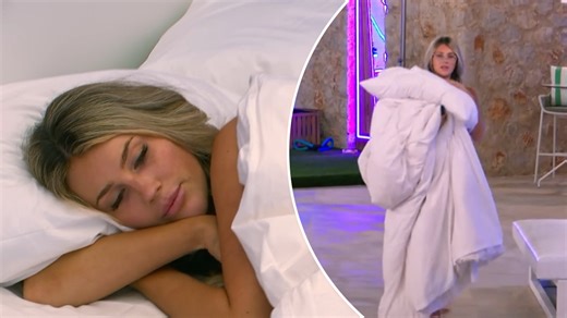 Lacey sleeps on the couch