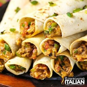 4.2K views · 161 reactions | RECIPE -> https://www.theslowroasteditalian.com/jalapeno-popper-taquitos-recipe/ These Baked Taquitos with jalapenos, beef, and gooey cheese make a perfect appetizer! | The Slow Roasted Italian | Facebook