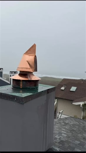 Warm Solutions Inc American Chimney Services on Instagram: "Our client is ecstatic our professional service technicians solved his downdrafts with this beautiful Copper High Wind Chimney Cap. Living so close to the ocean, the winds in Half Moon Bay can be relentless. To eliminate high wind downdrafts, we installed a wind directional chimney cap which uses its aerodynamic design to create a vacuum, pulling smoke up and out, preventing wind from forcing smoke back down; these caps redirect wind, i