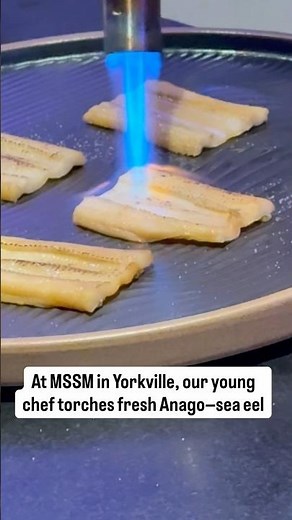 At MSSM in Yorkville, our young chef torches fresh Anago—sea eel—coaxing out a smoky aroma