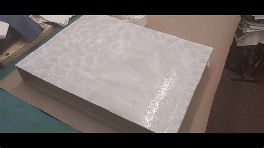 Covering a Large slip case (500mm x 370mm x 65mm). York Bookbinding " Slip cases & "Clam shell" boxes are always made with lap joints for extra strength. It's important to make sure that any air is removed before going on to the next stage. | YORK Bookbinding