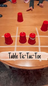 136 reactions | Table tic-tac-toe! For this game, create a tic-tac-toe board on a table using tape. Then grab cups (can use different colored ones or since we only had one color, we placed tape around one set of cups). Slide the cups on the table to play tic-tac-toe. Try to be the first one to get three in a row! Inspired by: Pinterest #kidsactivities #kidsactivity #familytime #familygames #familygamenight #diygames #letskeepkidsbusy | CraftMonsterz | Facebook